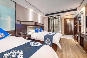 Family Triple Room, City View | Premium bedding, memory-foam beds, free WiFi, bed sheets - Tianmen Summit Hotel (Zhangjiajie)