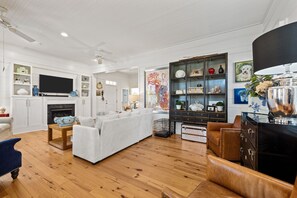 Smart TV, fireplace, books