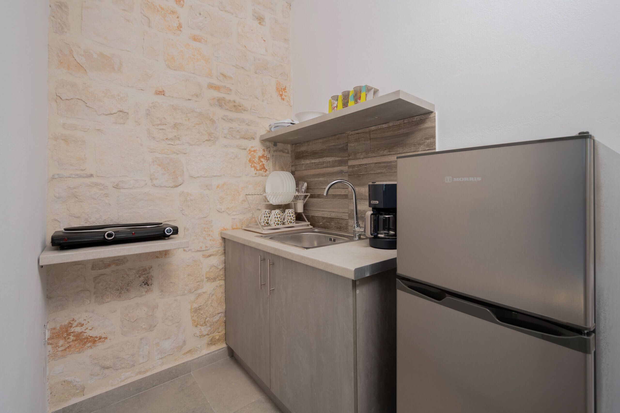Fridge, coffee/tea maker, electric kettle, toaster