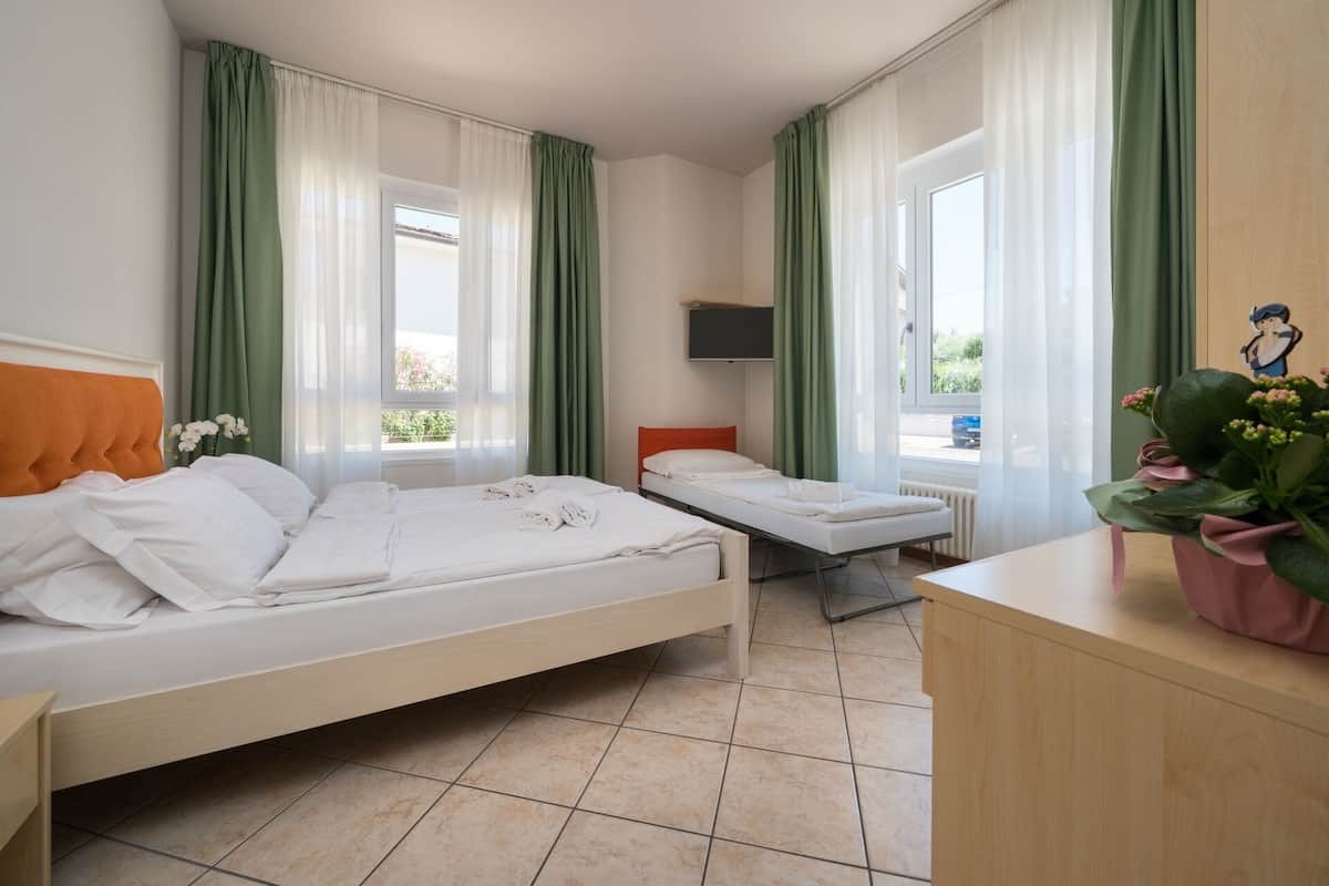 Kamar Triple Comfort