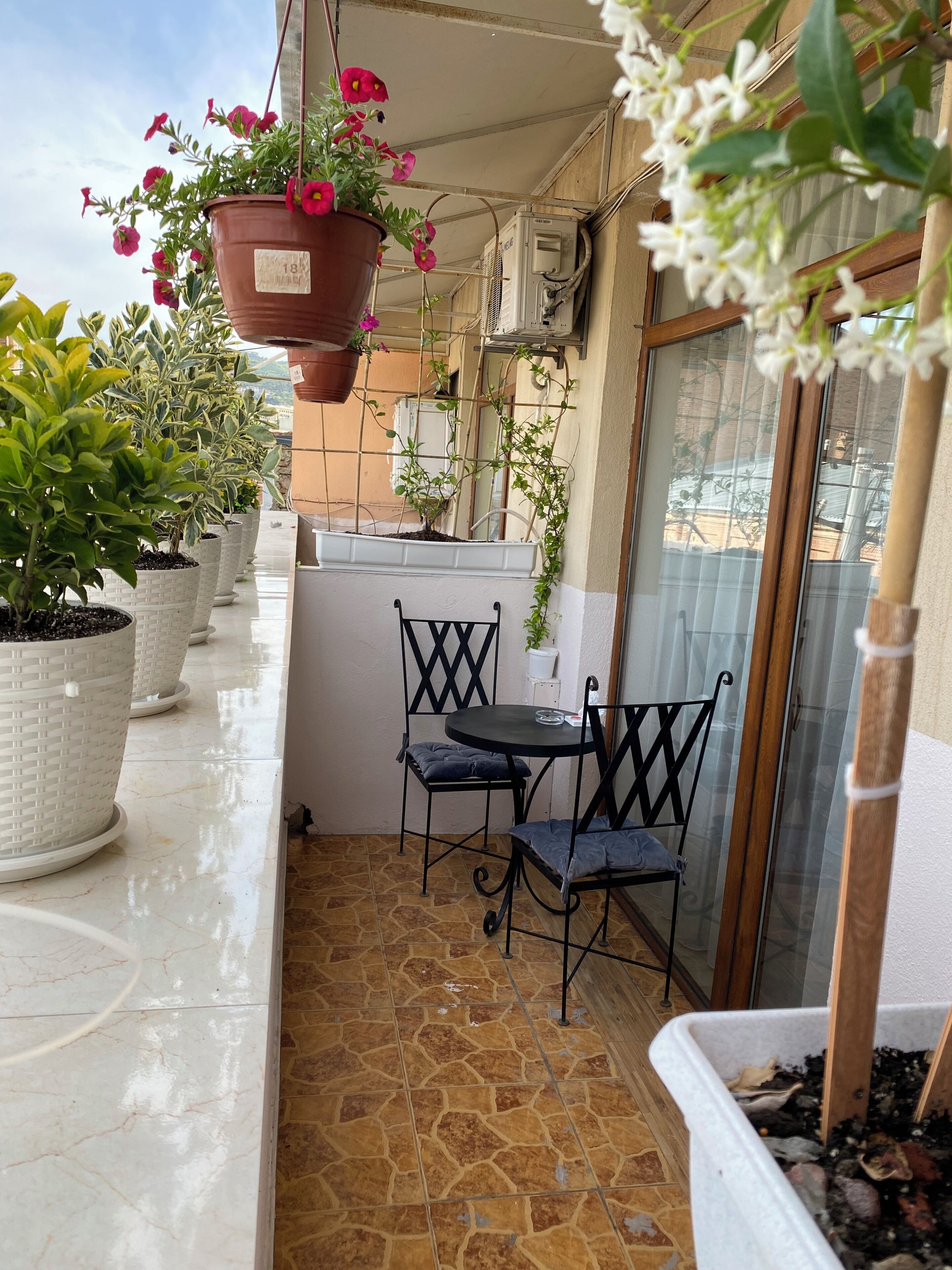 Deluxe Quadruple Room, City View | Outdoor dining