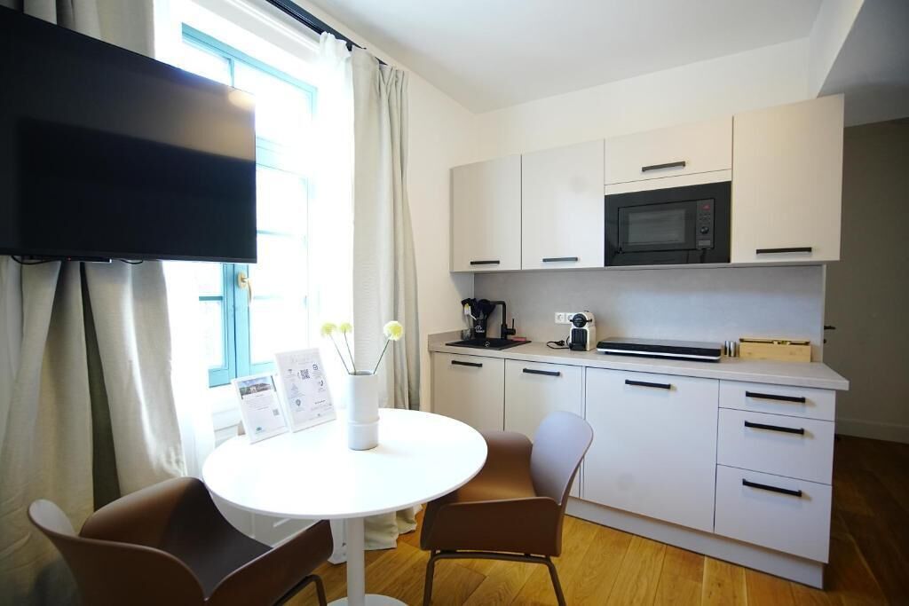 Klassiek appartement, 1 kingsize bed, keuken, uitzicht op bergen | Privékeuken | Een koffiezetapparaat/waterkoker, een broodrooster