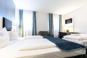 Chambre Triple Standard, vue ville