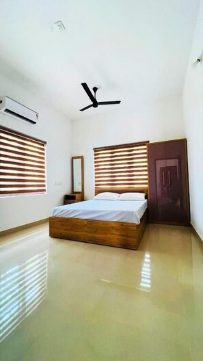 In-room safe, soundproofing, free WiFi - Easy Nest Residency (Kannur)