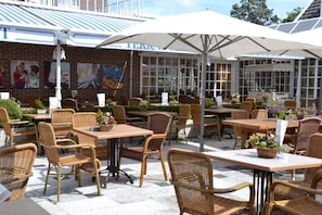 Outdoor dining - Serene Getaway w/Onsite Dining | Near Dunes, Nature & Coastal Adventures (Bergen)