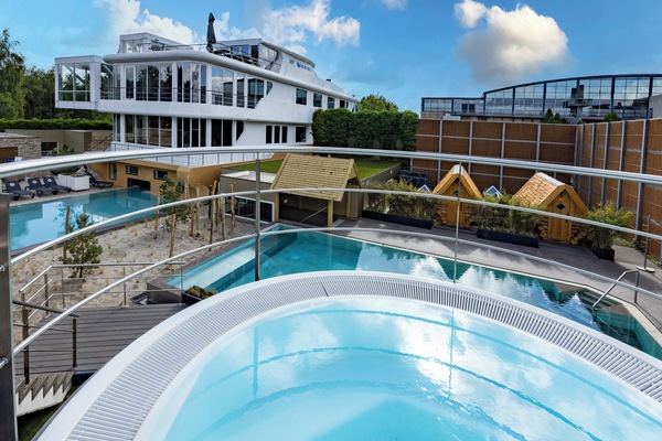 Soak sky-high in the rooftop hot tub with resort views.