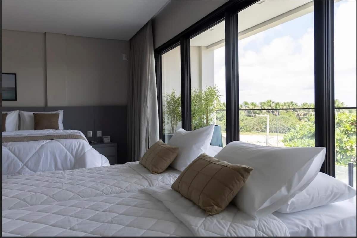 Suite superior | Minibar, caja de seguridad en la habitación y muebles diferentes