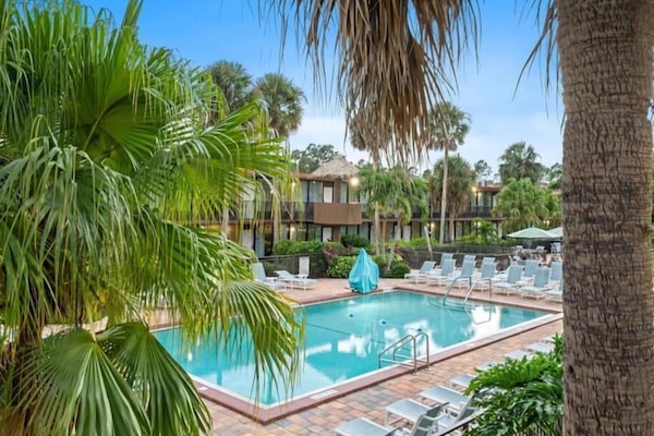 Outdoor pool, pool umbrellas, sun loungers
