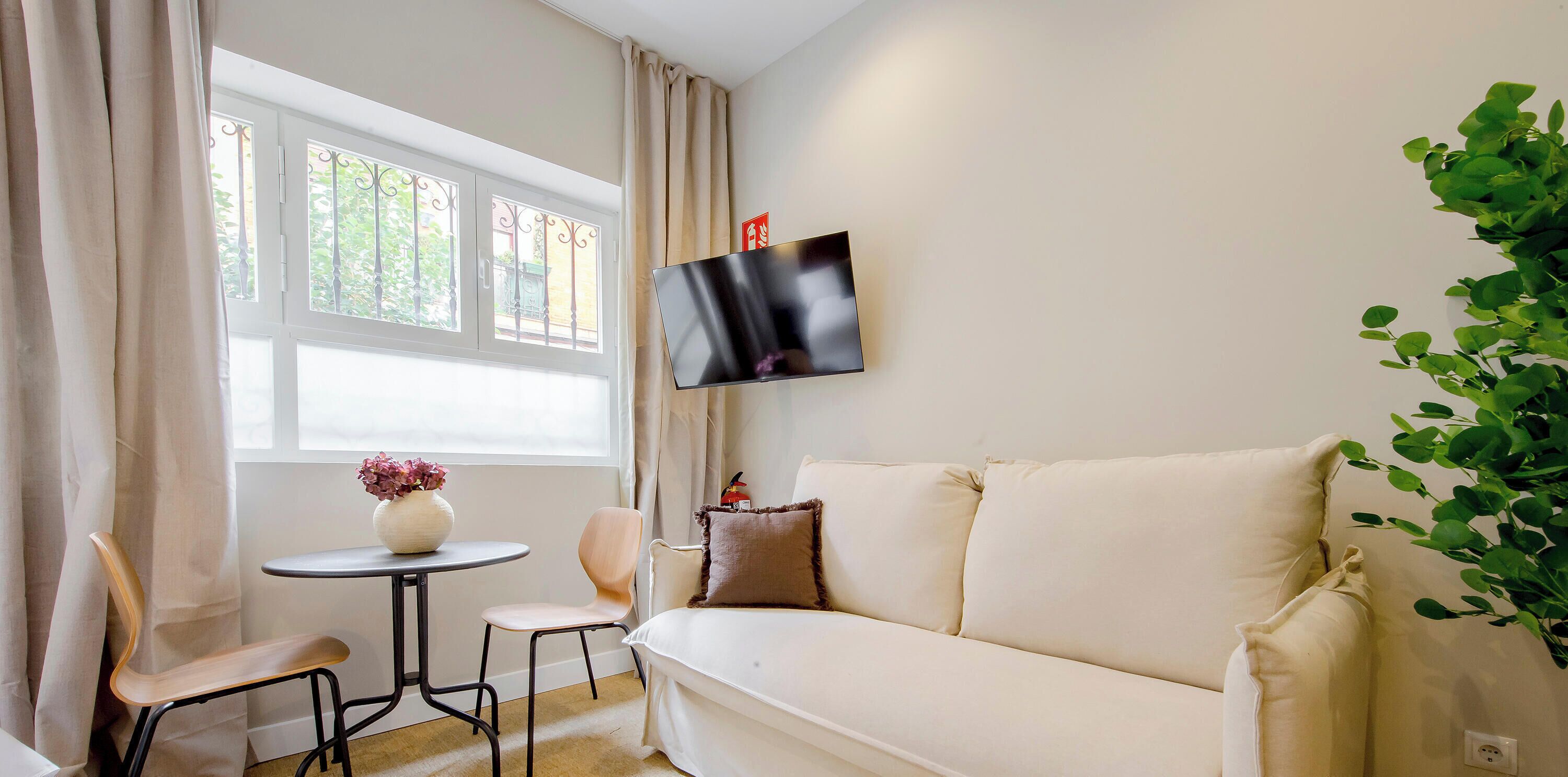 Studiosuite – comfort, 1 dobbeltseng med sovesofa | Oppholdsområde