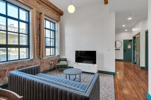 Premier Apartment, 3 Bedrooms, Kitchen, City View | Living area | 42-inch Smart TV with digital channels, streaming services - Schaeffer Hotel (New Orleans)
