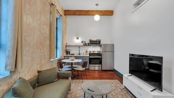 Deluxe Apartment, 3 Bedrooms, Kitchen | Living area