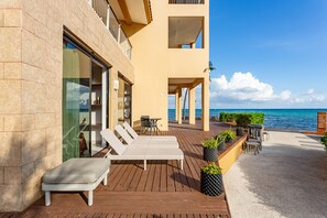 Terrace/patio - Stunning Beachfront 3BR Condo | Private Pool | Gym (Playa del Carmen)