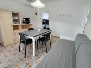 Apartment, 2 Bedrooms, Garden View | Dining room - Stylish Flat for Your Perfect Getaway in Bibione (San Michele al Tagliamento)