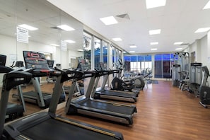 A gym with treadmills, ellipticals, and weight machines. - 'Chevron Renaissance' - Level 8 - Riverside (Surfers Paradise)