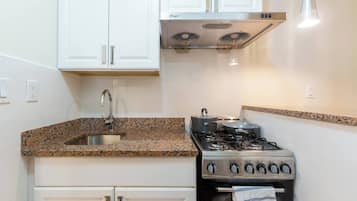 Suíte estúdio conforto, vista para a cidade | Cozinha privada