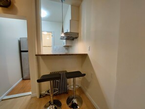 Suite studio Confort, vue sur la ville | Intérieur