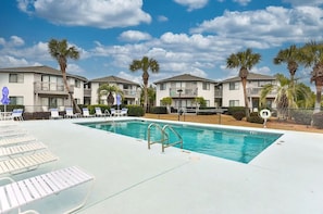 A pool area with lounge chairs and a lifeguard stand. - 🌊Great Location | Walk to Beach | 2 Pools | Crystal Village II 26A⛱️ (Miramar Beach)