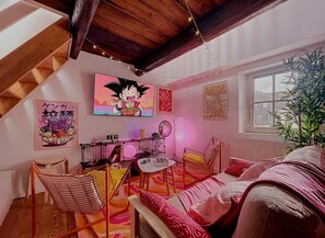 Living area - Blush Heaven - Private apartment with POP ambience! With free fiber and Netflix! (Nancy)