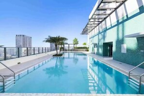 Outdoor pool, a heated pool - Walk to Everything Stylish 1BR in the Heart of Downtown- 1 Block from Brightline (Miami)