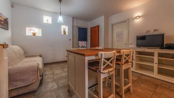 Leilighet, hageutsikt | Oppholdsområde