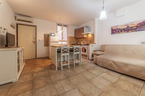 Appart'hôtel, vue jardin | Coin séjour