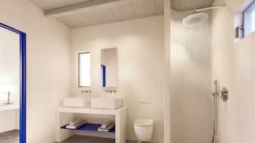 Eco-friendly toiletries, hair dryer, bathrobes, slippers