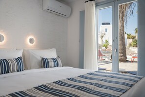 Suite junior, balcón | Sábanas de algodón egipcio, ropa de cama de alta calidad y edredón 