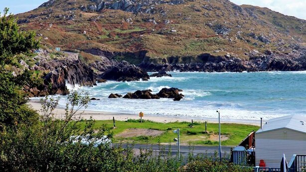 A coastal landscape with a mountain, beach, and a building with a flat roof. - 4 Bed in Caherdaniel (oc-ii04851) (Caherdaniel)