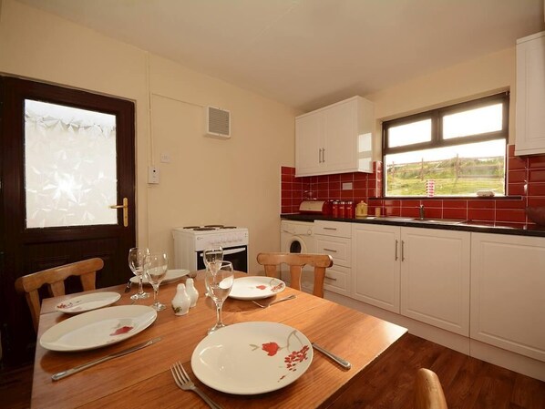 Microwave, oven, high chair, cookware/dishes/utensils