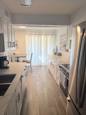 Fridge, microwave, oven, stovetop - Cozy 3-bedroom condo in Seascape resort (Miramar Beach)