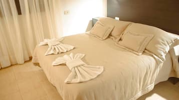 Suíte conforto, sacada, vista para o jardim