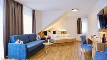 Tremannsrom – superior | Oppholdsområde