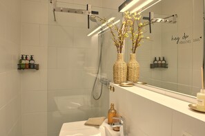 Shower, towels, soap, shampoo