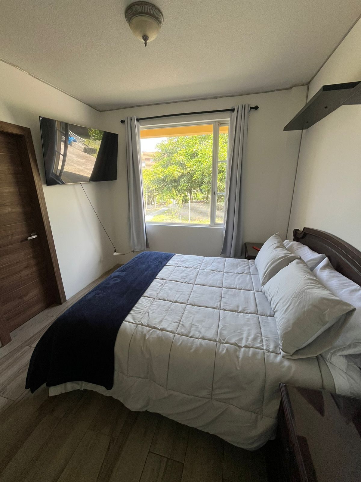 Habitación Confort doble, baño privado, vistas al jardín