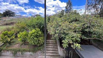 Deluxe Double Room, Private Bathroom, Garden View | Property grounds