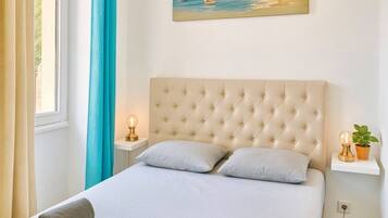 1 chambre, fer et planche à repasser, Wi-Fi gratuit, draps fournis