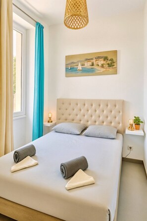 1 chambre, fer et planche à repasser, Wi-Fi gratuit, draps fournis