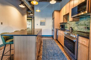 Fridge, microwave, oven, stovetop - Cozy Brick Loft | w/patio and free parking (Knoxville)