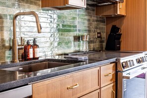 Fridge, microwave, oven, stovetop - Cozy Brick Loft | w/patio and free parking (Knoxville)