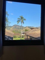 Suíte conforto, vista para a montanha | Parte interna