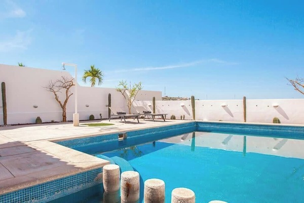Swim in style with a unique pool design and serene surroundings