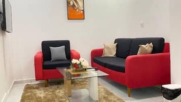 Suite – comfort, bakgårdsutsikt | Oppholdsområde