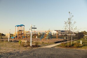 Cottage, Balcony, Sea View | Children's area - Chincoteague Bay RV Resort & Cottages (Chincoteague)