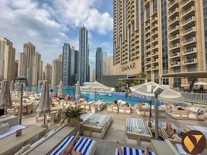 Outdoor pool - Emaar Residences with Direct Access to Marina Mall. (Dubai)