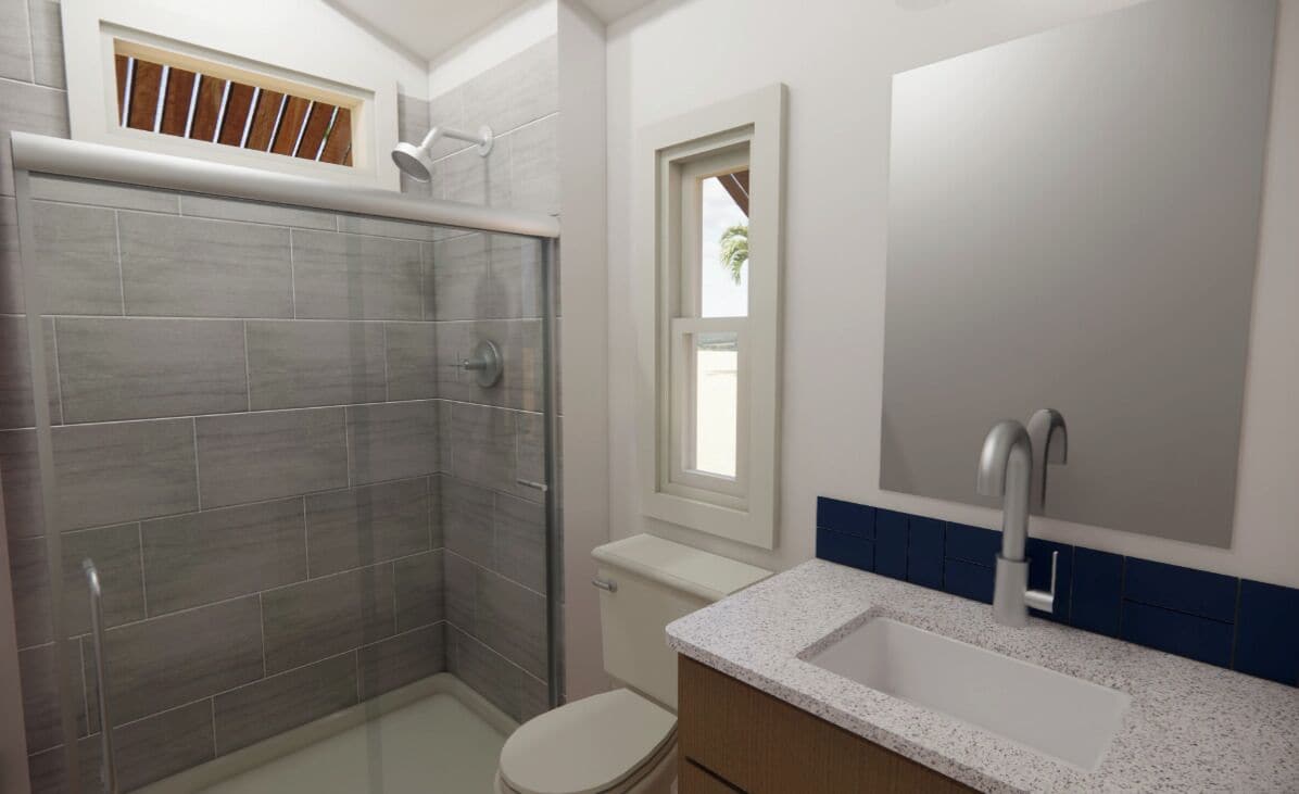 A bathroom with a shower, toilet, sink, and window.
