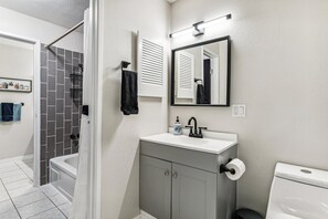 Hair dryer, towels, soap, toilet paper