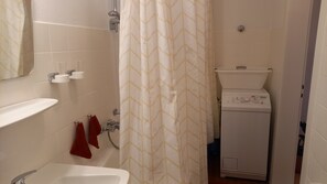 Hair dryer, towels, soap, shampoo