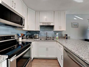 Condo, Multiple Beds (Grand Caribbean West 303) | Private kitchen - Grand Caribbean West 303 (Pensacola)