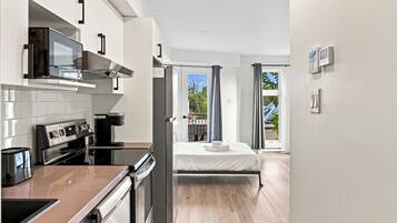 Classic Studio | Living area | 40-inch Smart TV with cable channels, Netflix, streaming services