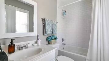 Hair dryer, towels, soap, toilet paper